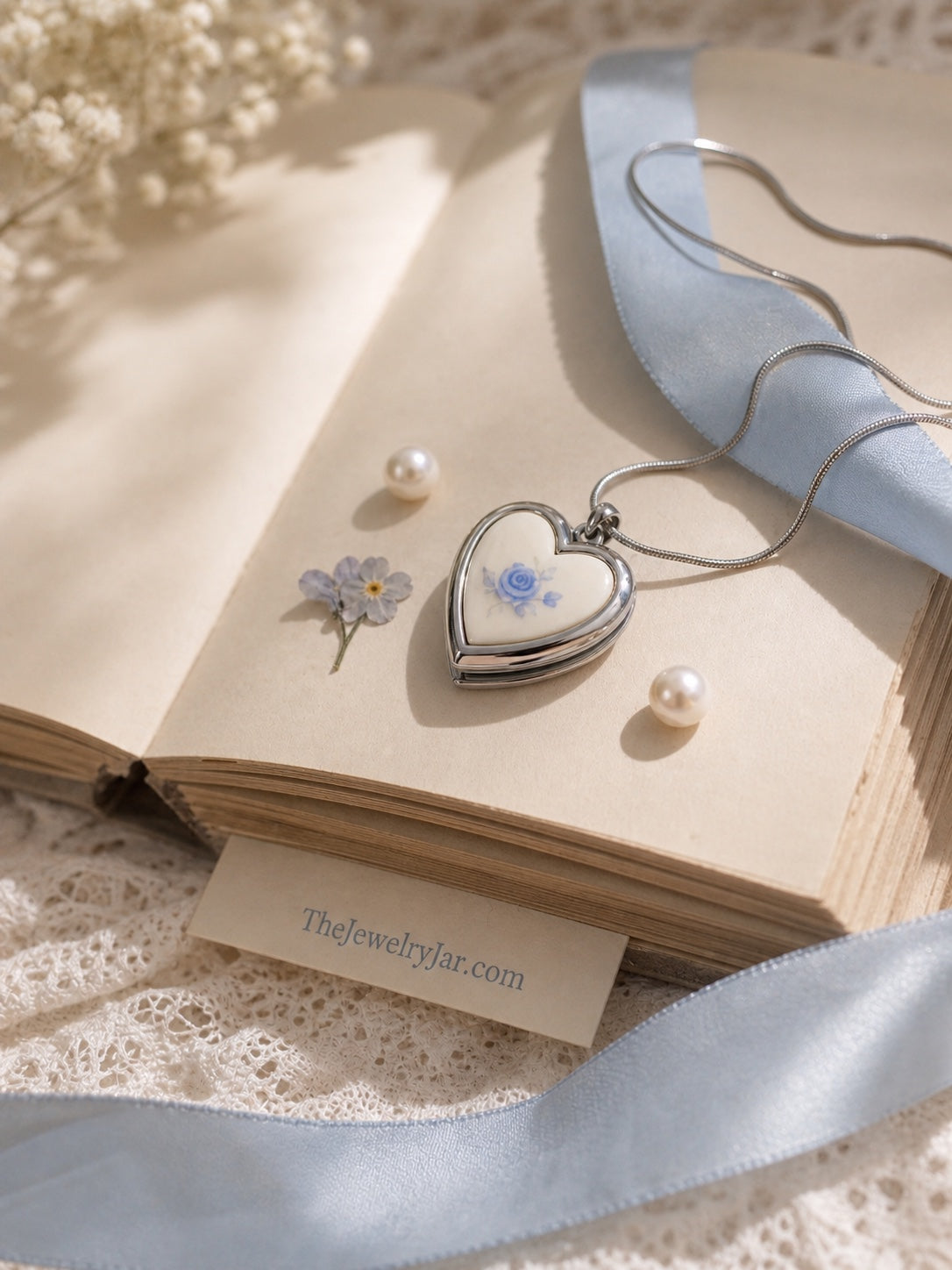 Silver blue rose floral heart locket detail